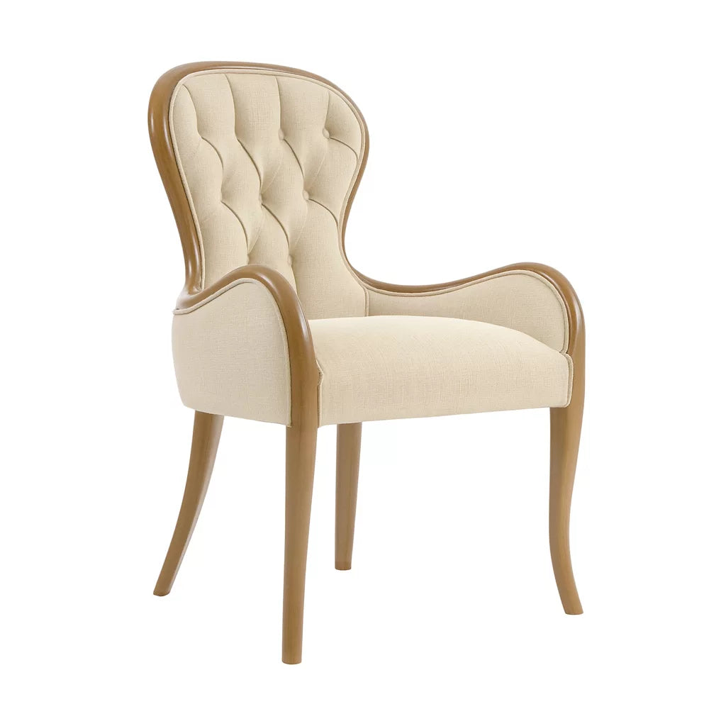 Bej rengi, ahşap ayaklı ve düğmeli sırt kısmına sahip avangart tasarım yemek sandalyesi.