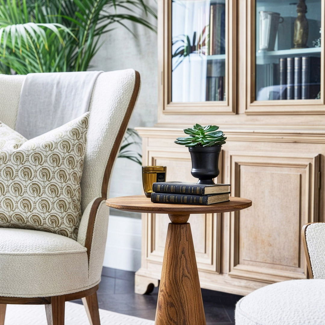 modern bir oturma alani kosesi dogal ahsap masif sehpa uzerinde kitaplar ve bitki ile dekoratif dokunuslar vornom