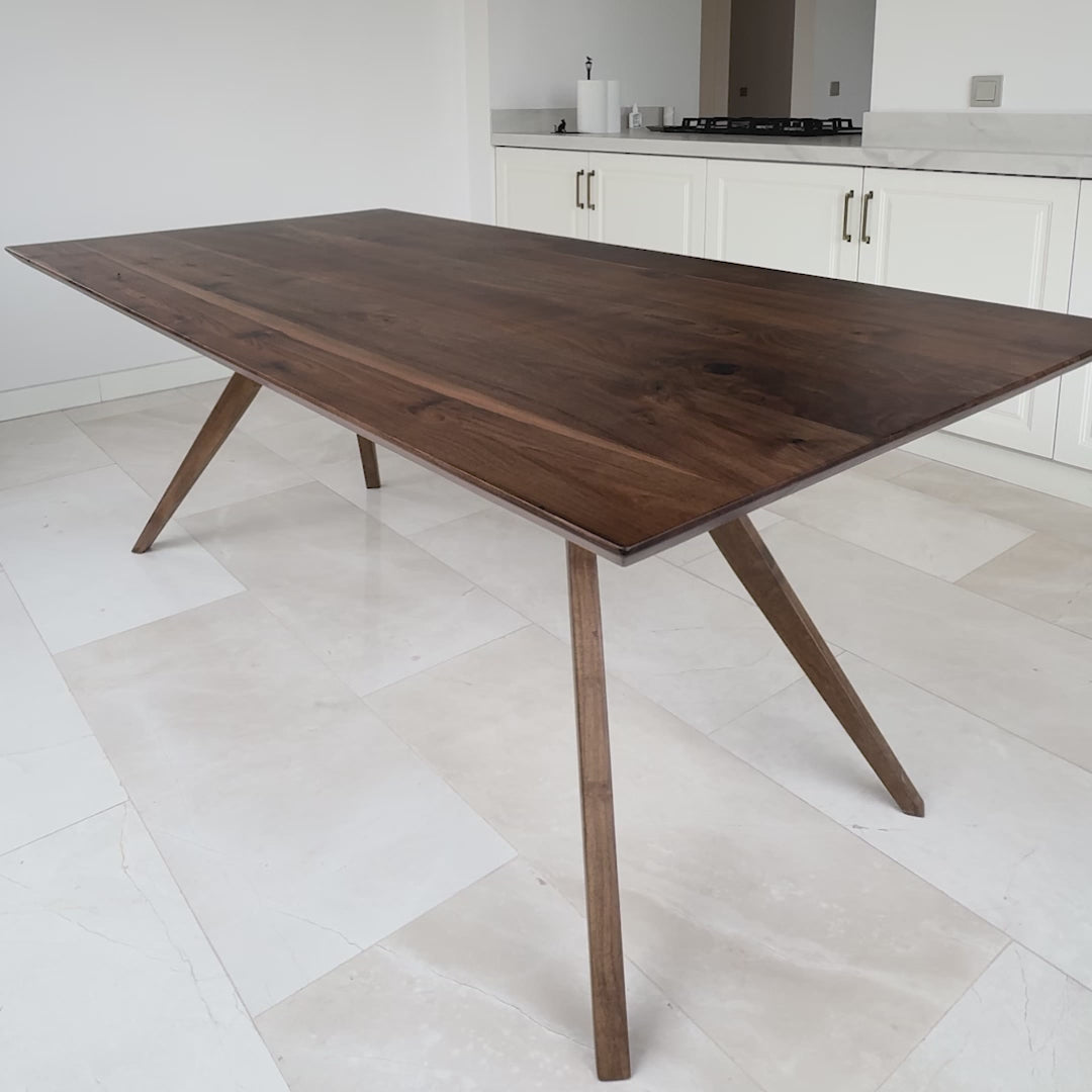 Luxury Vigo natural walnut dining table showcasing authentic wood grain craftsmanship   