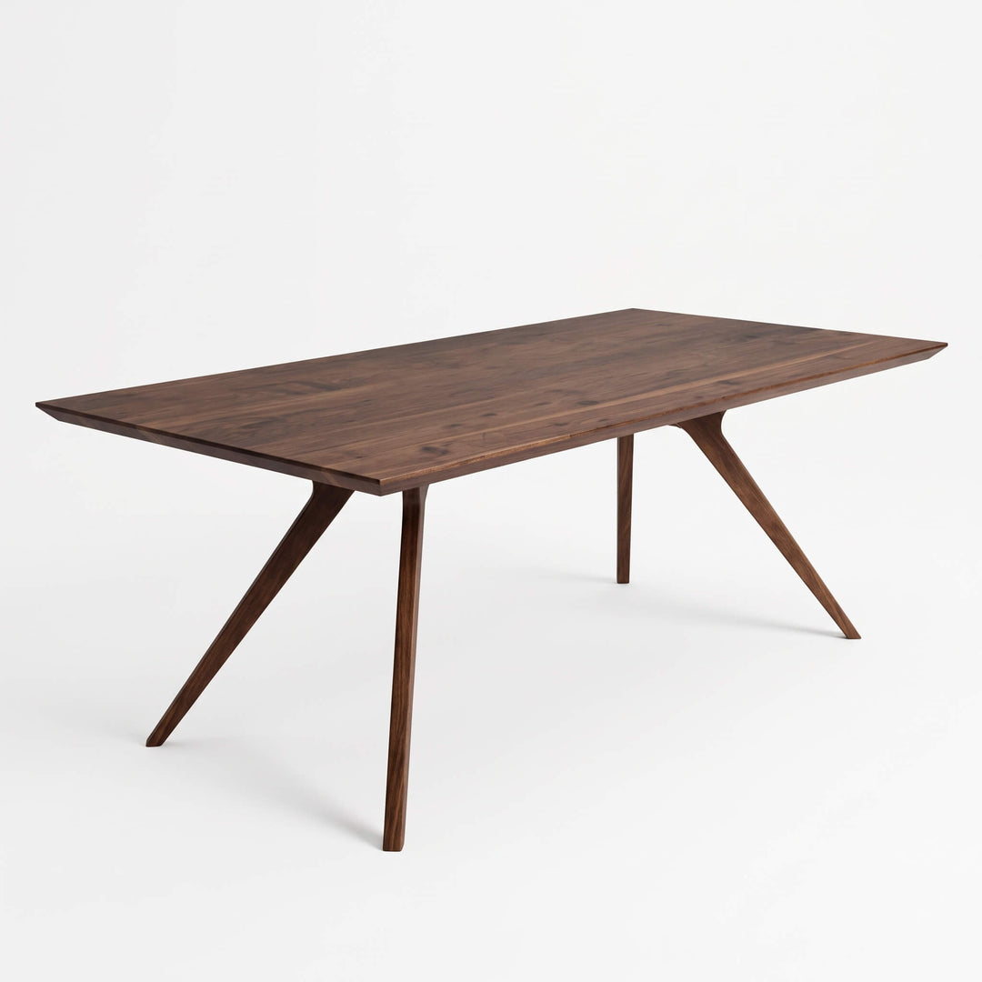 Modern indoor dining set featuring Vigo solid walnut wooden table and upholstered chairs   