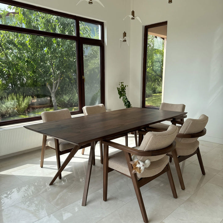 Modern solid wood dining table made of premium walnut for luxury home interiors   
